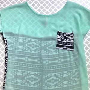 Sheer, teal and Aztec print top. Size medium.